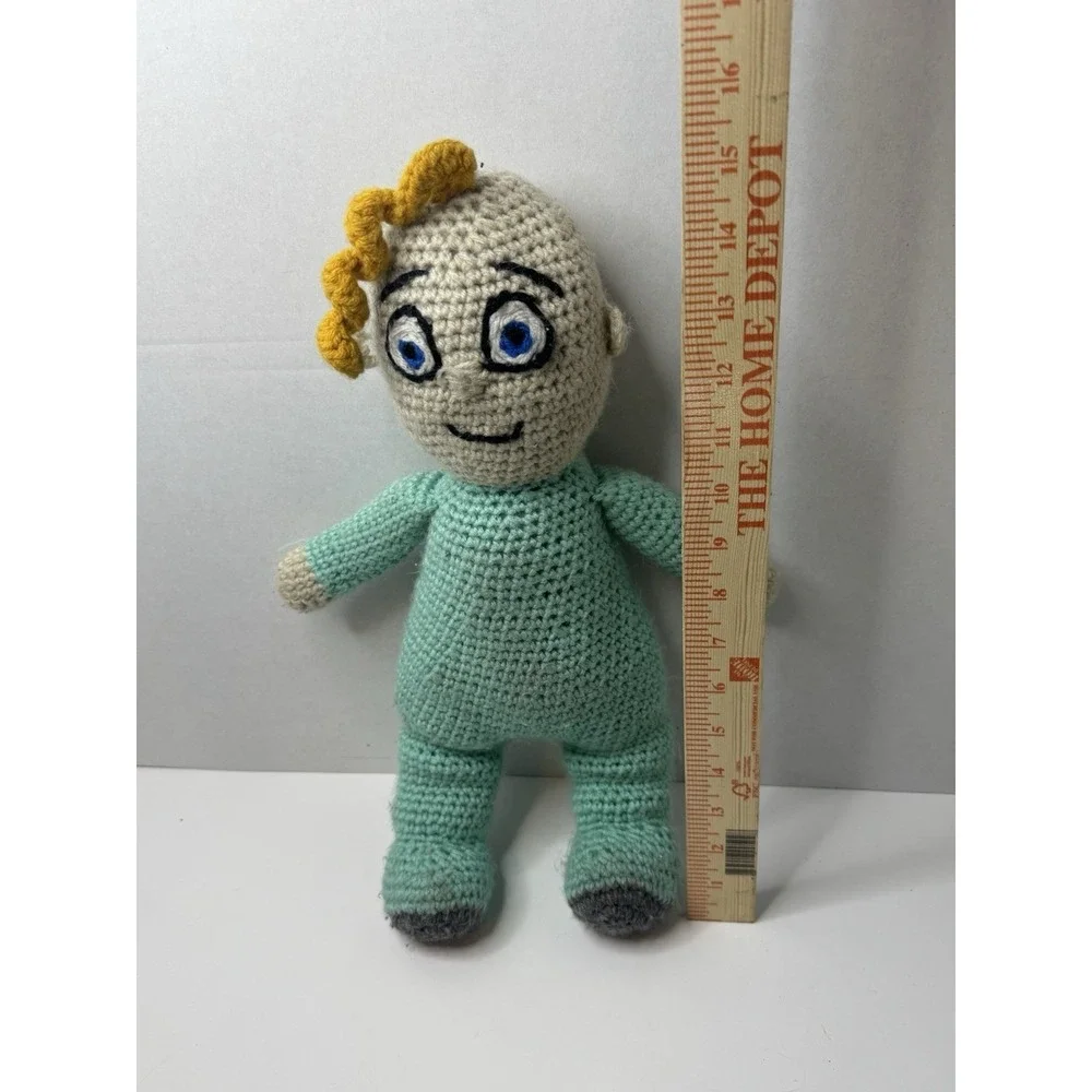 crochet doll of JJ from the children's‎ cartoon Cocomelon.